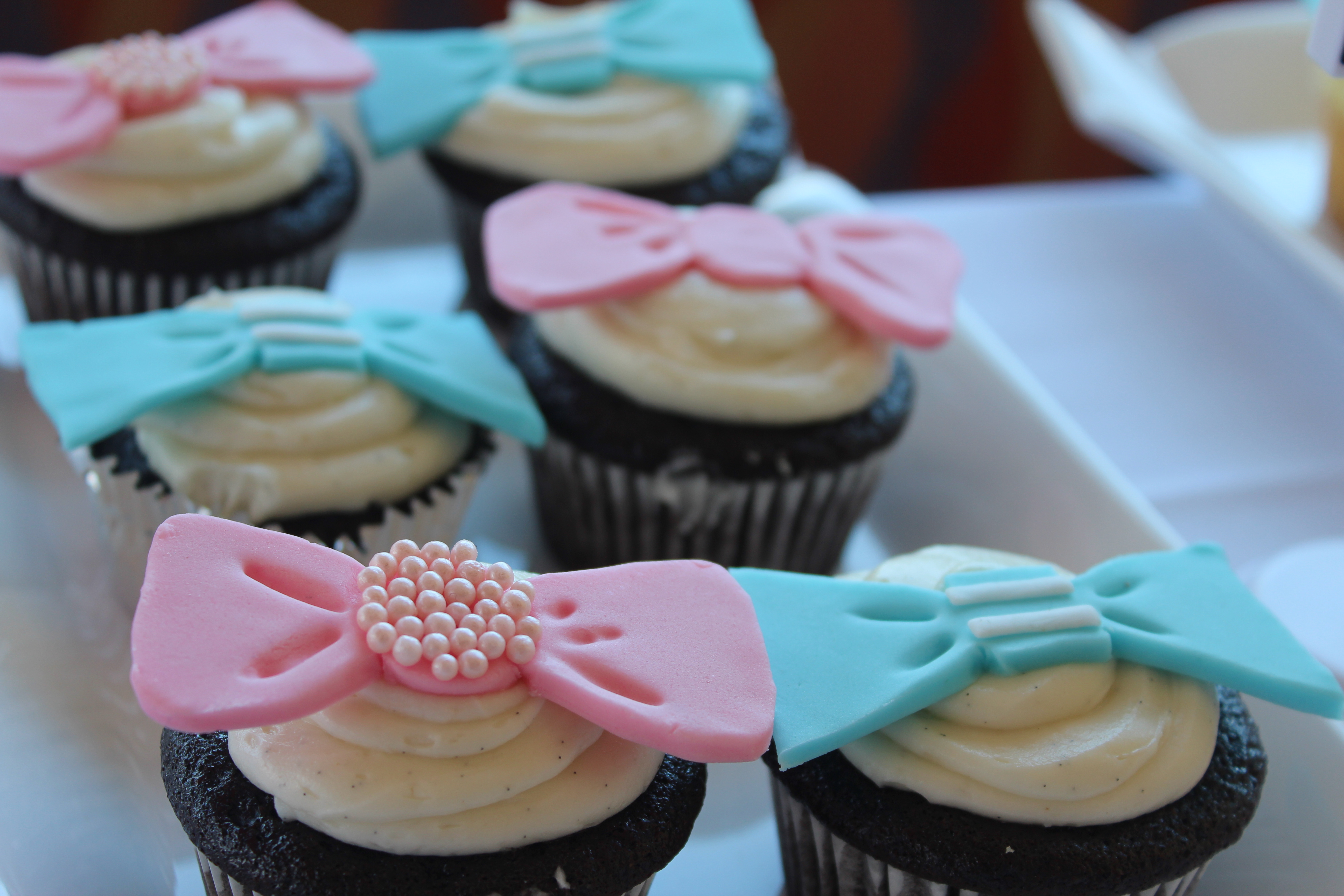 My baker Adah made the most incredible cupcakes! She even made the cute bows and bow ties from scratch!
